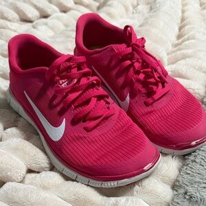 Nike Women’s Bright Pink Athletic Running Shoes with White Swoosh